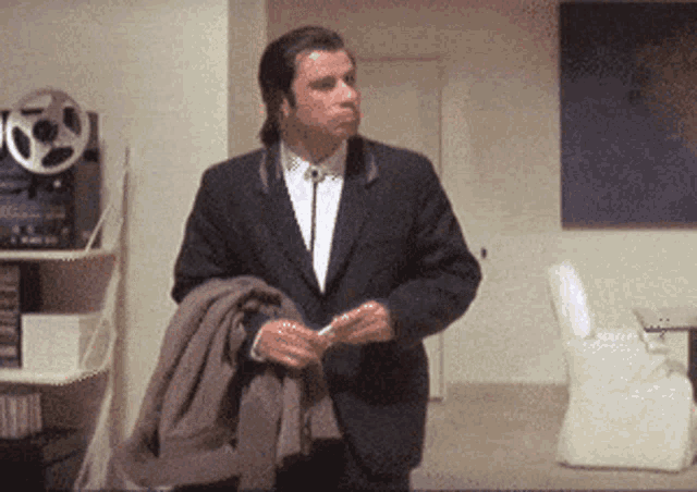Confused John Travolta meme